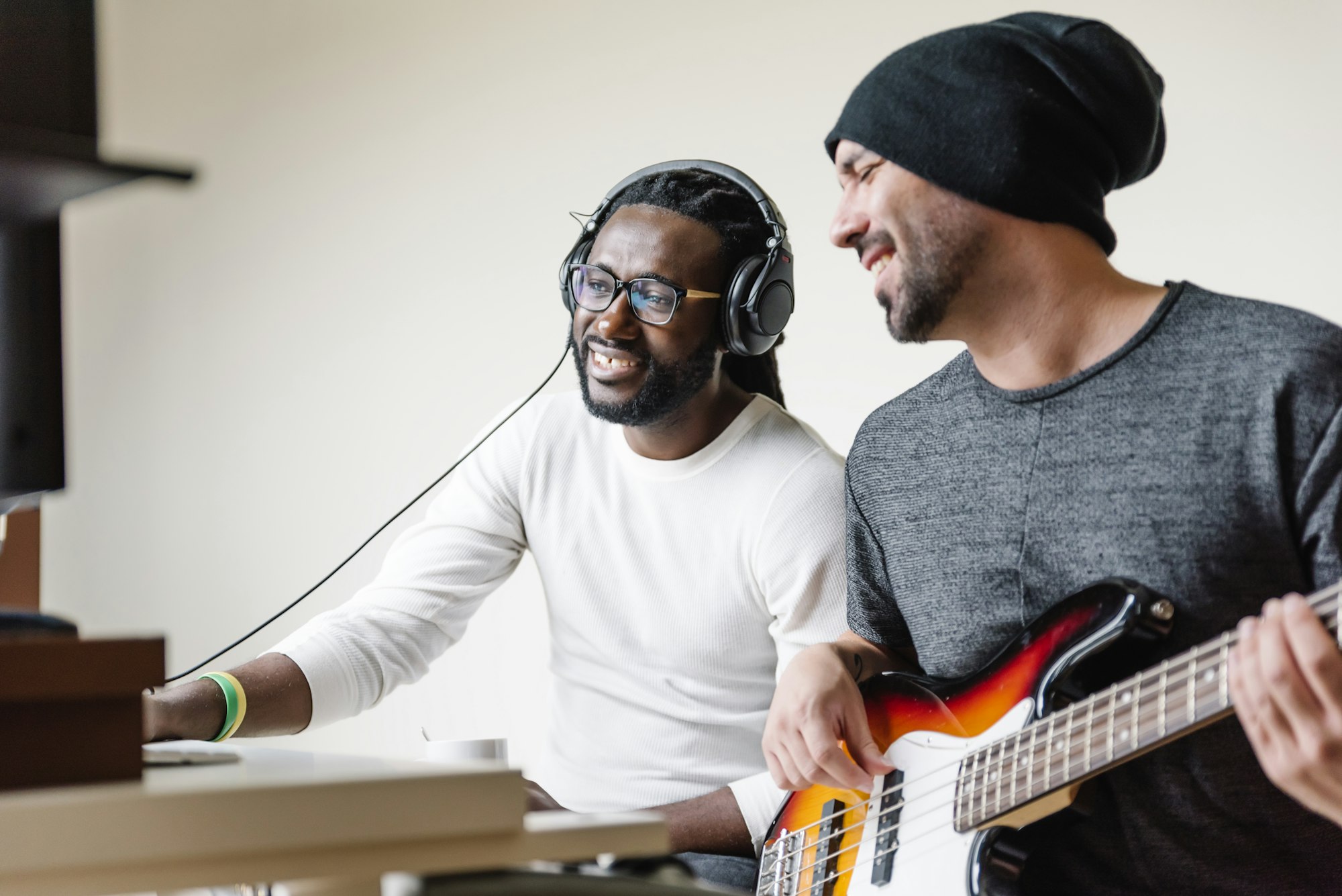 Artists producing music in their home sound studio.