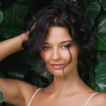Perfect Portrait of Natural Beauty Woman Among Exotic Tropical Foliage